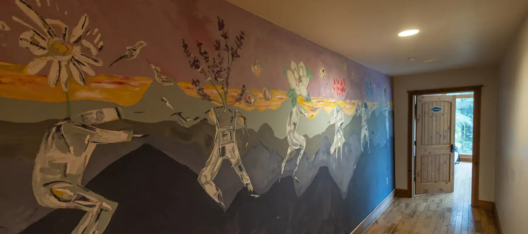 Painted art mural in the hallway at Lake House Academy